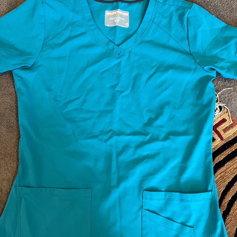 Scrubs sets pants small and shirts medium. For medical or dental practices